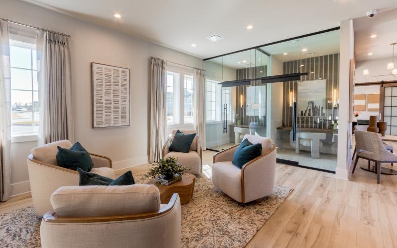 a living room with a large glass door
