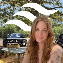 image of a leasing agent smiling outdoor